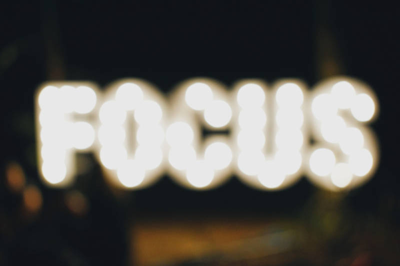 blurry image of the word FOCUS